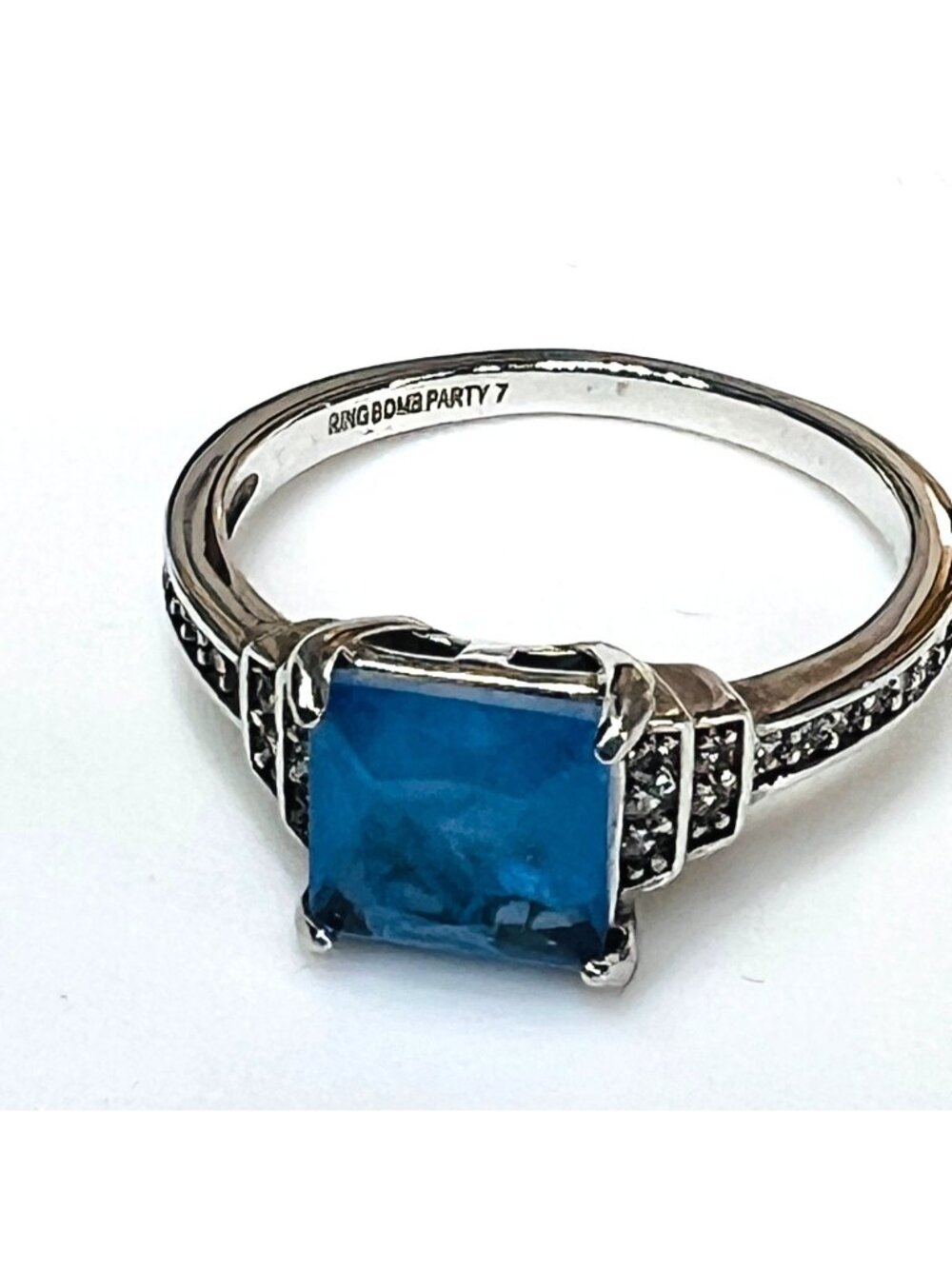Ring Bomb Party Ring, size 7 blue gemstone silver color band